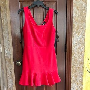 Red Sleeveless Dress with Ruffle Hem